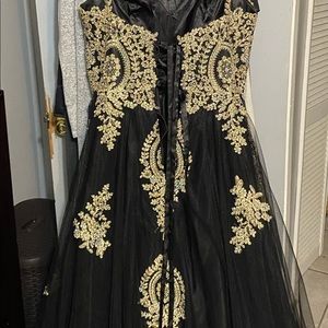 Black and gold sequence prom gown